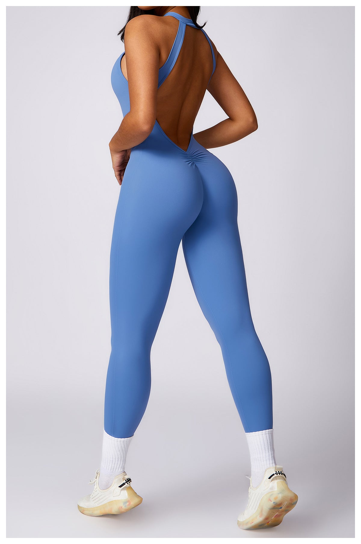 Sleek langry blue backless yoga jumpsuit with ruched waist, fashion ملابس