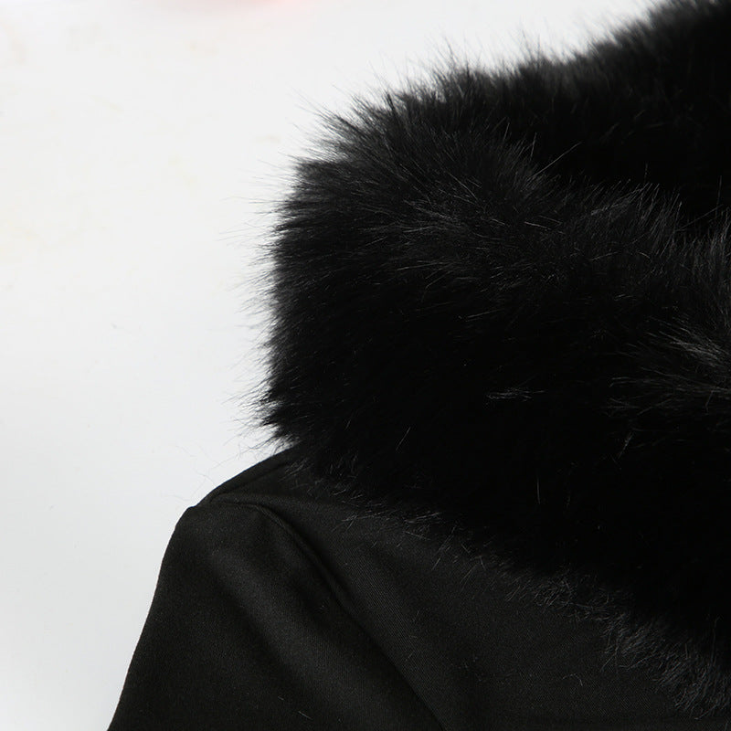 Elegant black top with fur-trimmed collar for sophisticated fashion and ملابس style