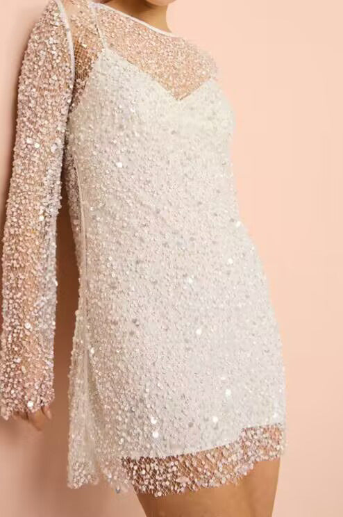 Sparkly white mini dress from Breathtaking Party Dress, perfect for English fashion events and ملابس celebrations