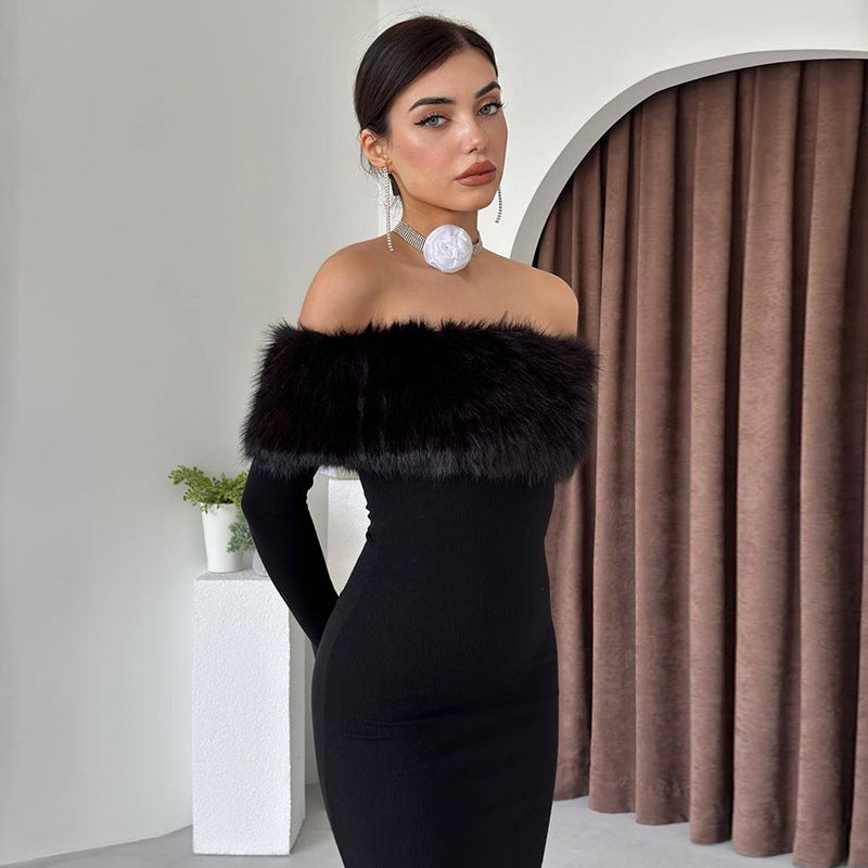 Elegant black off-the-shoulder dress with fur trim, perfect for sophisticated fashion choices