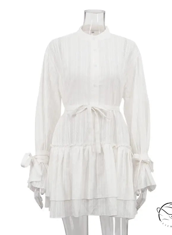 Delicate white long sleeve French Tie ruffled dress with lace cuffs