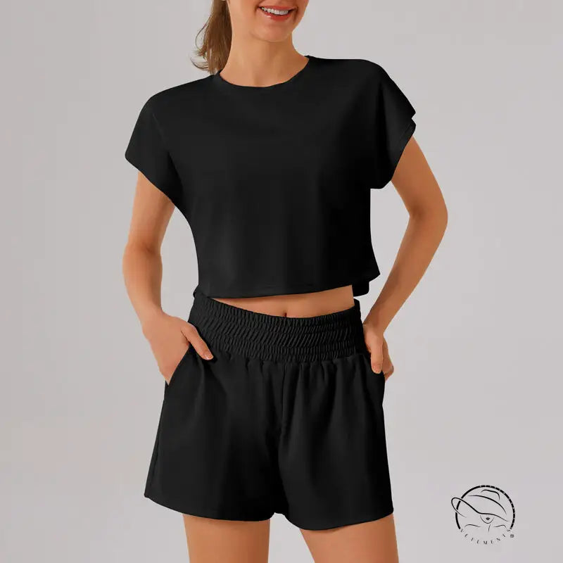 Black loose sports yoga fitness set with crop top, shorts, elastic waistband, pockets