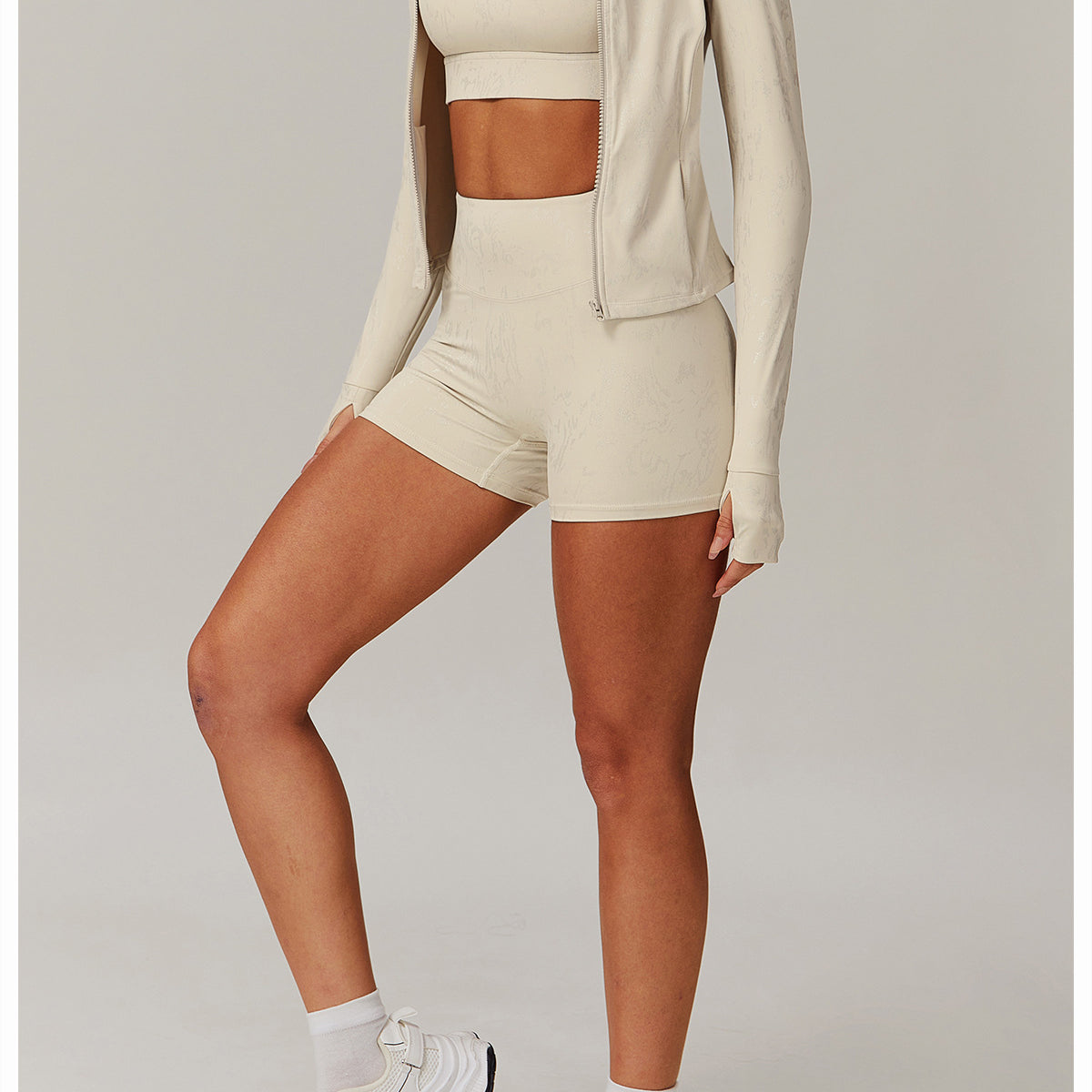 Woman modeling beige Quick Drying Breathable Yoga Wear Coat with langry fashion and ملابس style