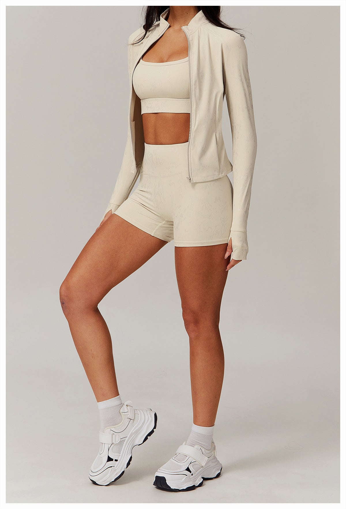 Woman modeling beige Quick Drying Breathable Yoga Wear Coat with langry fashion and ملابس style