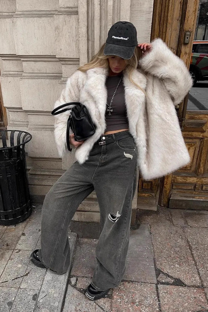 Fashionable white faux fur coat by Langry