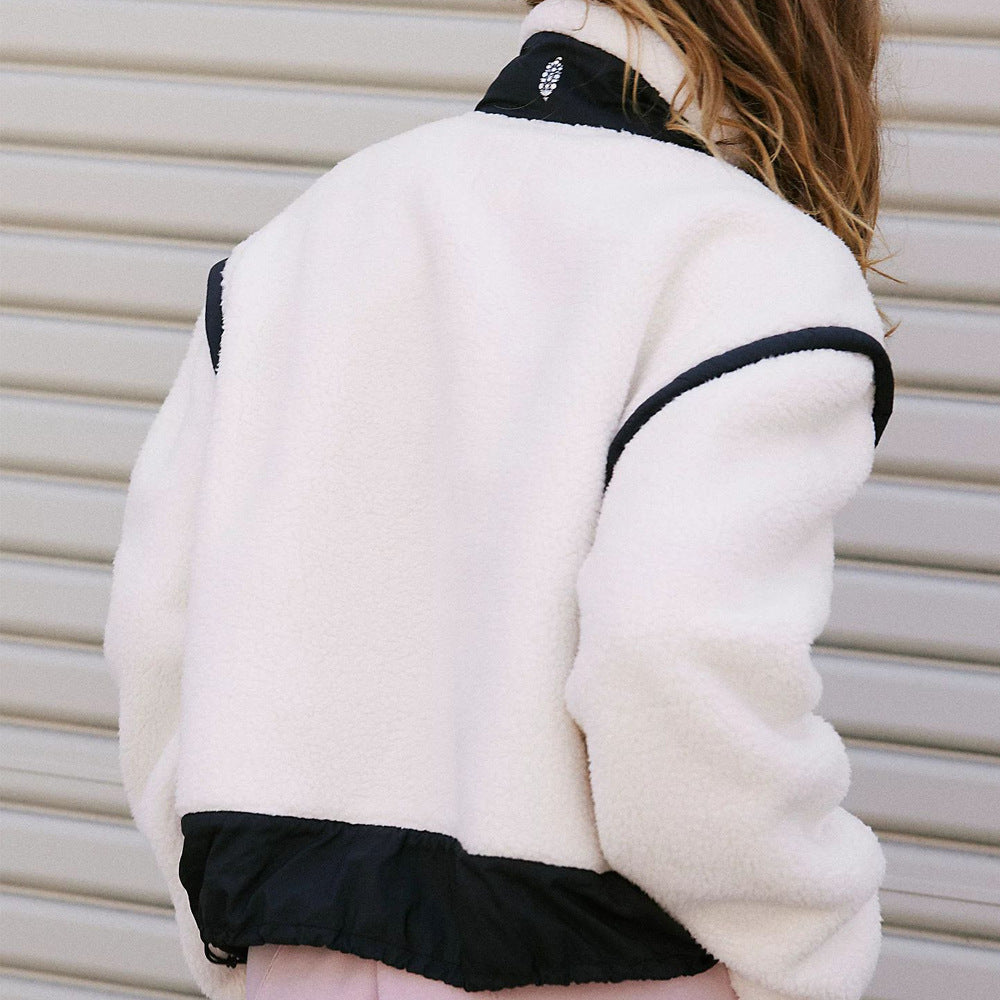 White fleece jacket with black trim from the Langry Outdoor Lambswool Cardigan collection