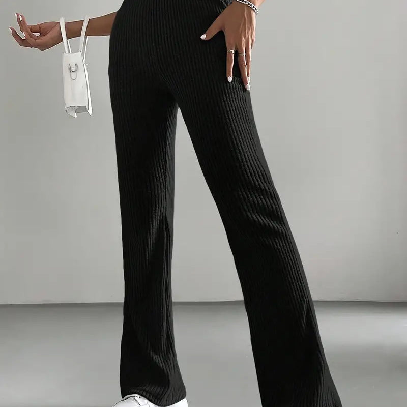 Black ribbed flare-leg casual knitted match pants displayed in a product image