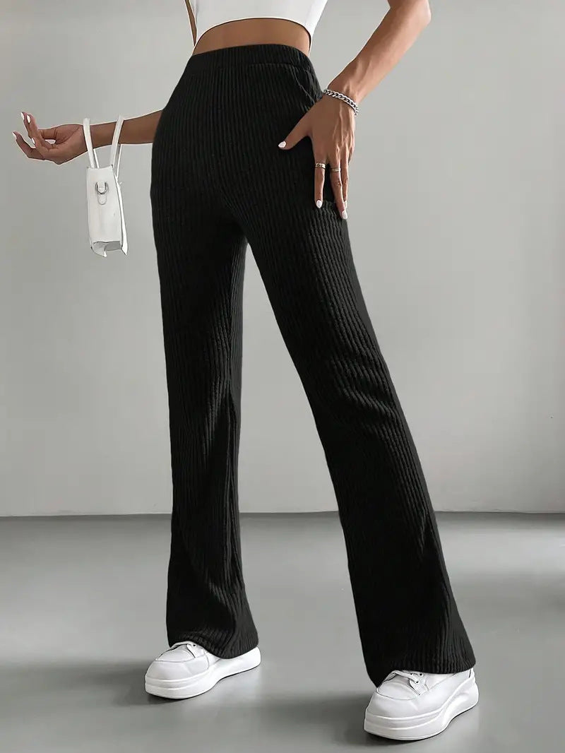 Black ribbed flare-leg casual knitted match pants displayed in a product image