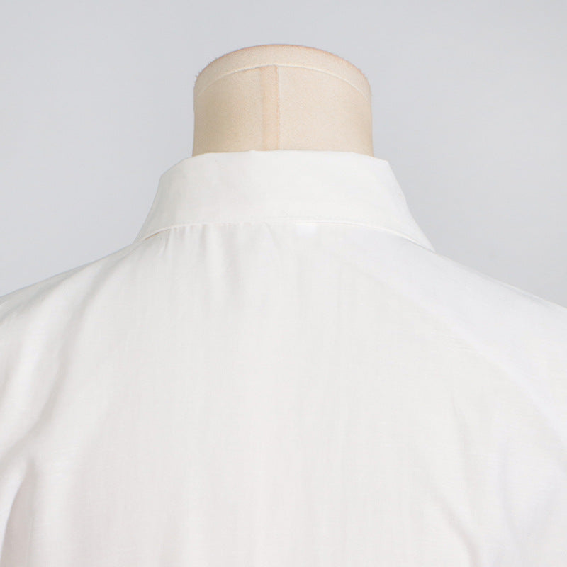 Back view of a White Collared Maxi Dress featuring Embroidery and Hollow Out Design