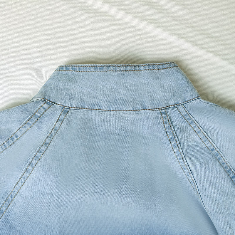 Light blue denim jacket back highlighting casual fashion and ملابس styles for men