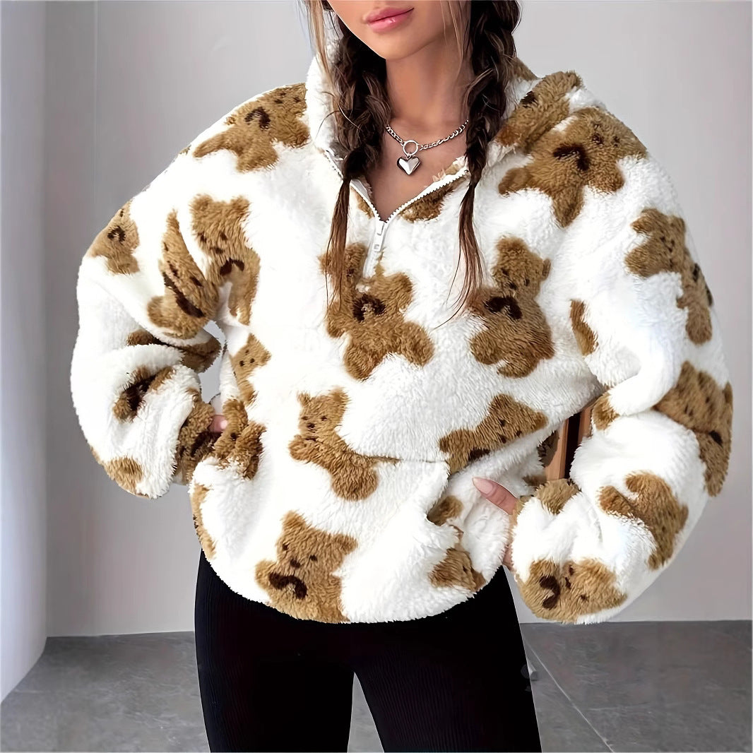 Fluffy white pullover sweater featuring teddy bear print pattern for stylish casual fashion