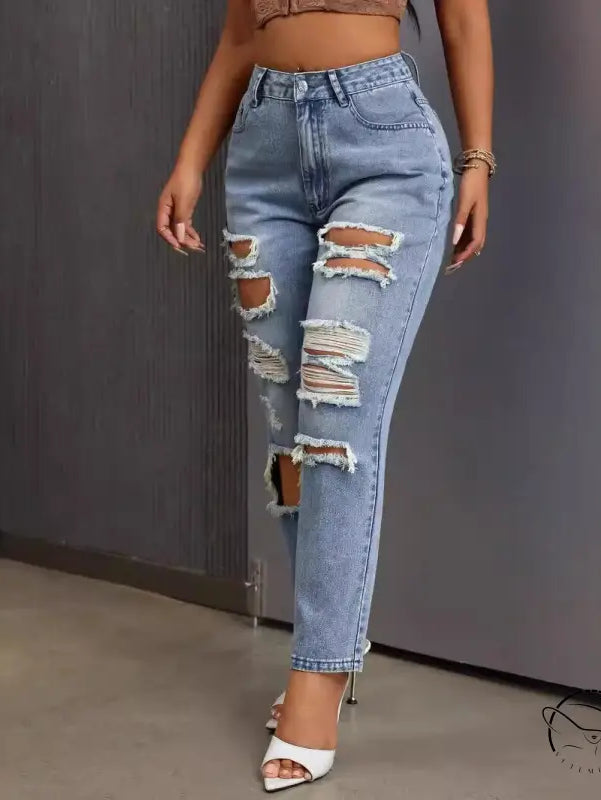 Slimming skinny ripped jeans in light-wash denim