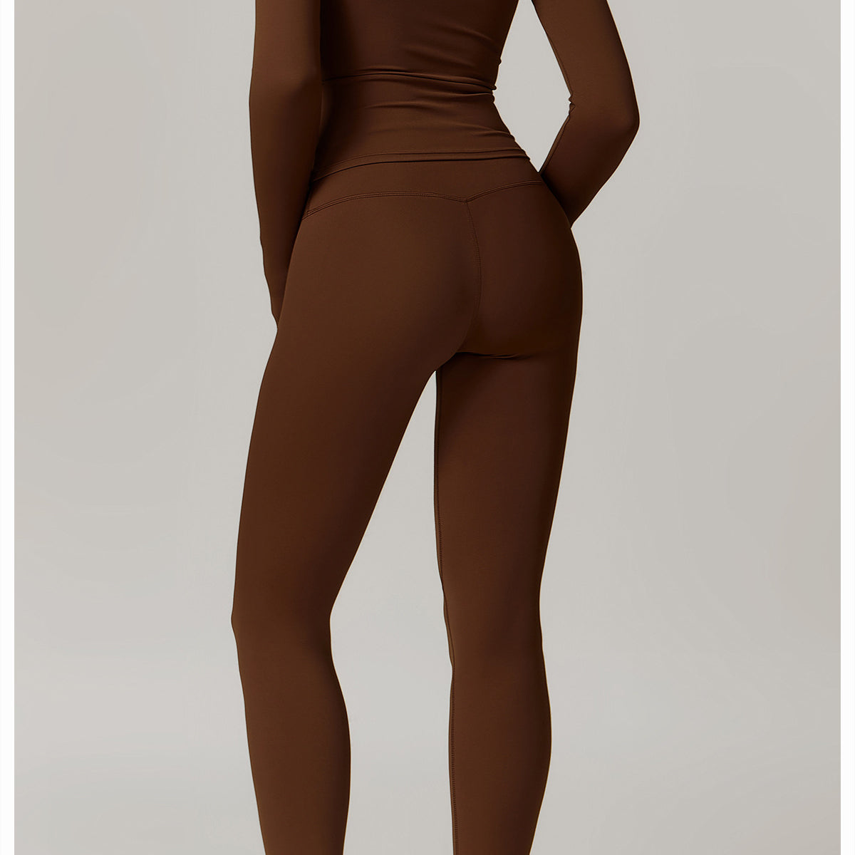 Brown long-sleeved athletic jumpsuit and white sneakers for Outdoor Running Sports Fitness Suit