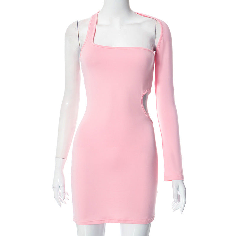 Pink form-fitting sleeveless dress with one long sleeve, a captivating evening fashion piece