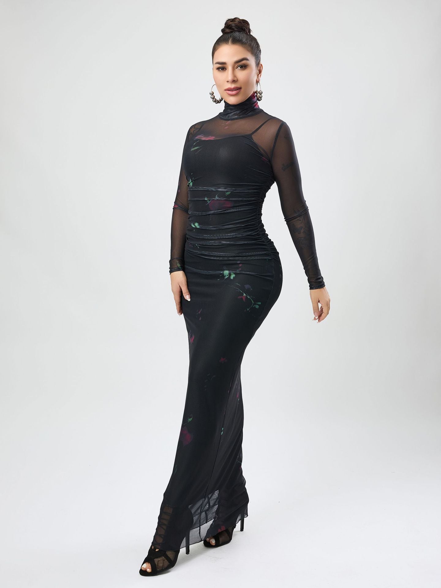 Elegant floral-patterned mesh maxi dress showcasing sophisticated fashion and luxury style