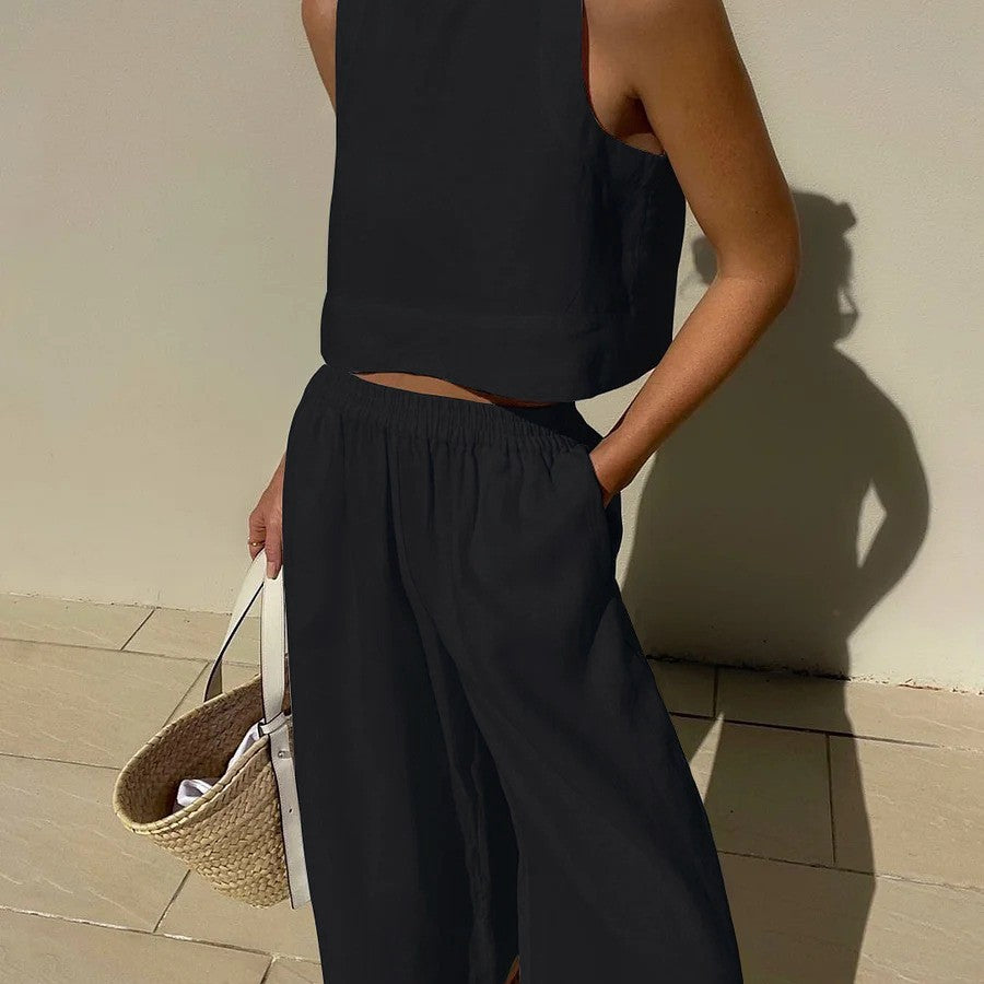 Black sleeveless crop top and wide-leg pants set for stylish casual fashion ملابس