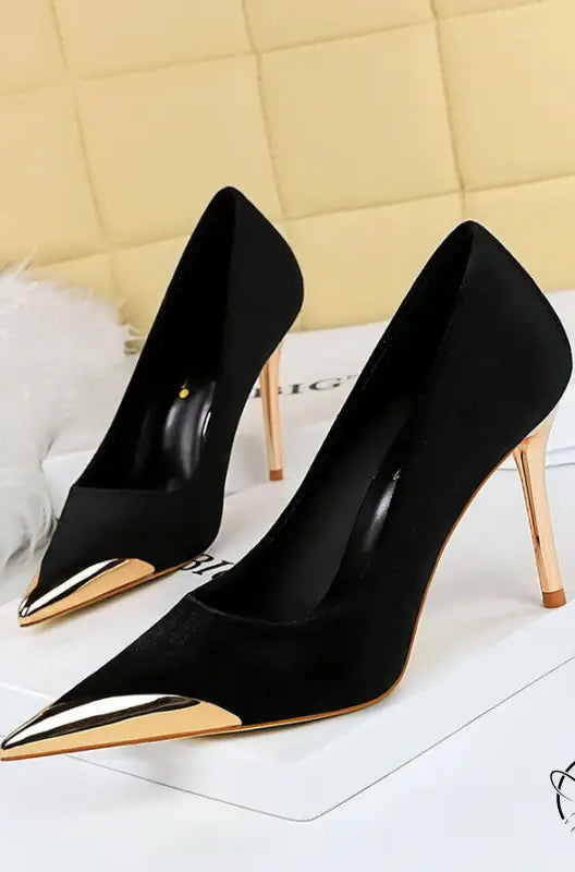 Black suede langry fashion pumps with gold pointed toes and stilettos