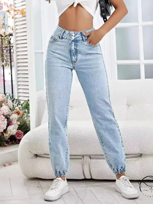 Light wash high-waisted drooping loose denim pants with elastic cuffs
