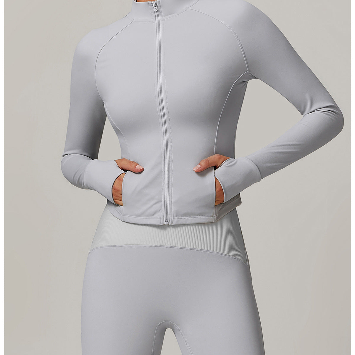 Light gray Yoga Windproof Warm Sports Jacket featuring fitted sleeves and side pockets