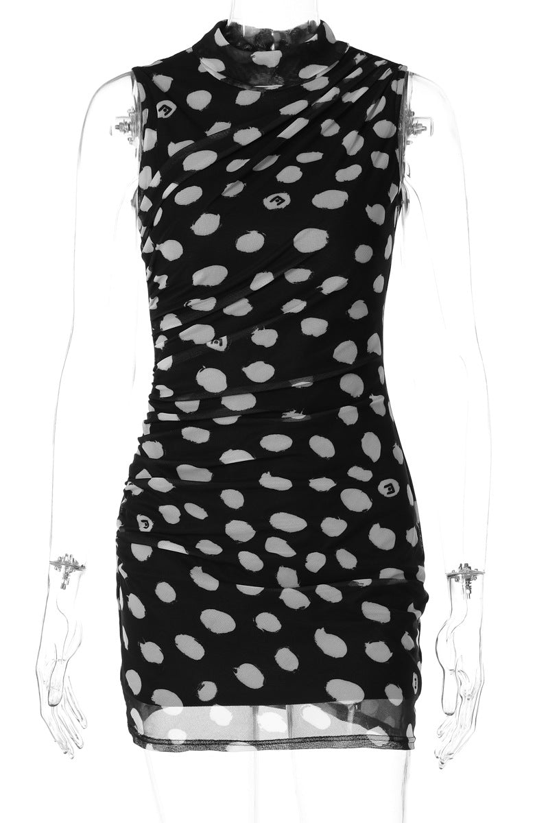 Black and white polka dot mesh sheath dress with sheer sleeves