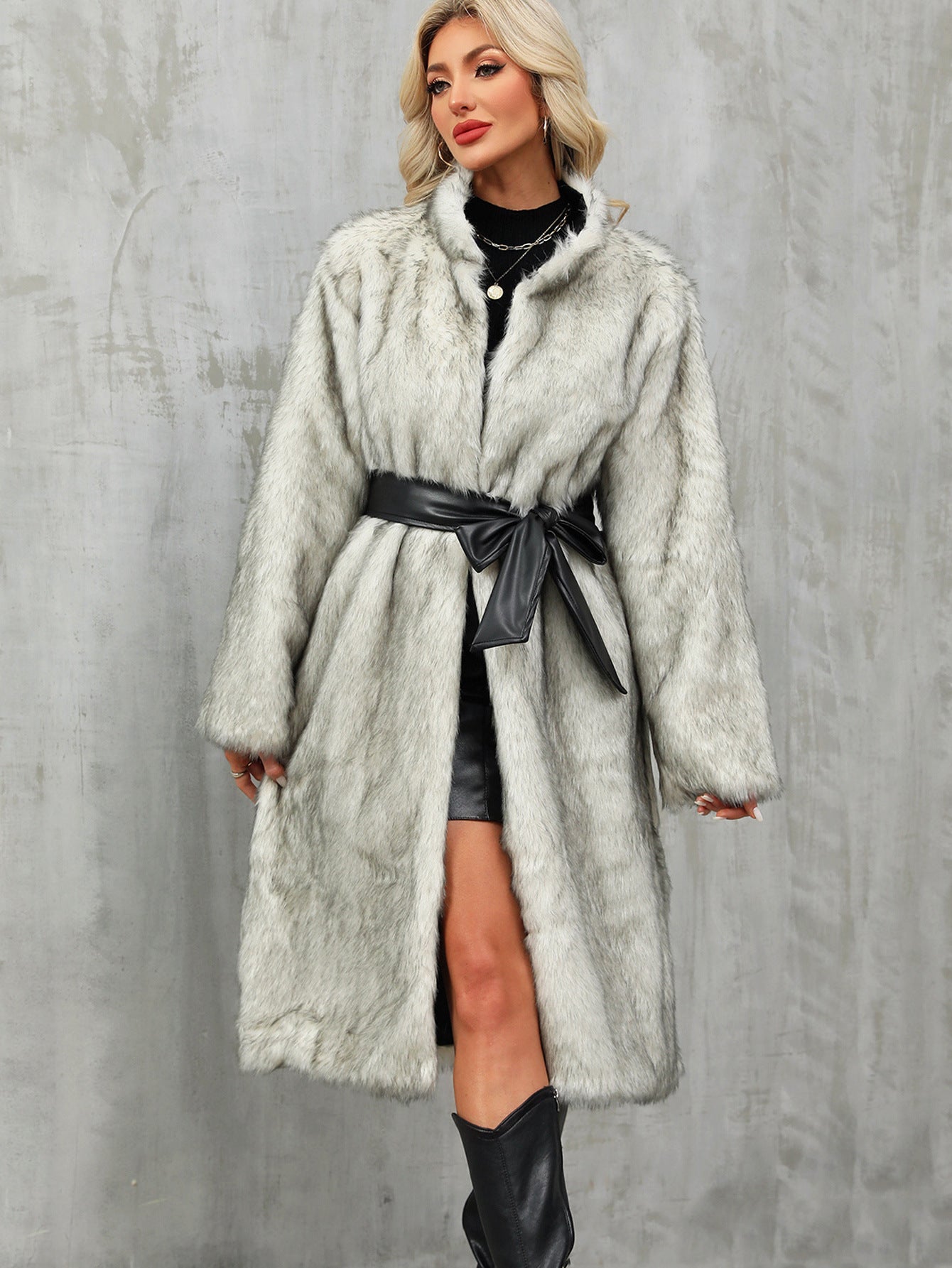 Elegant long faux fur coat with black leather belt and bow