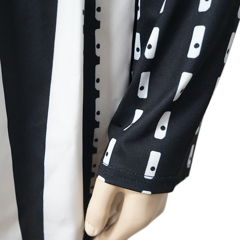 Elegant waist trimming striped dress featuring a black and white patterned sleeve for stylish fashion