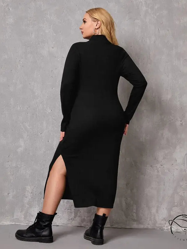 Elegant winter mid length dress: black long-sleeved midi with side slit