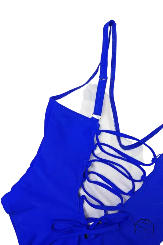 Vibrant royal blue one-piece swimsuit with lace-up back