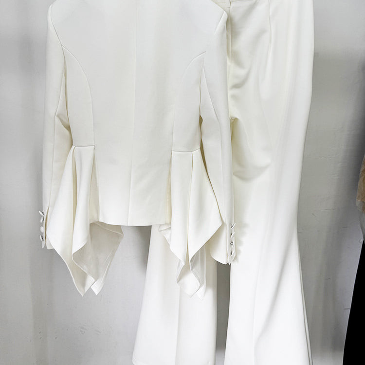 Langry fashion white asymmetrical blouse with bell sleeves and high-waisted pants set