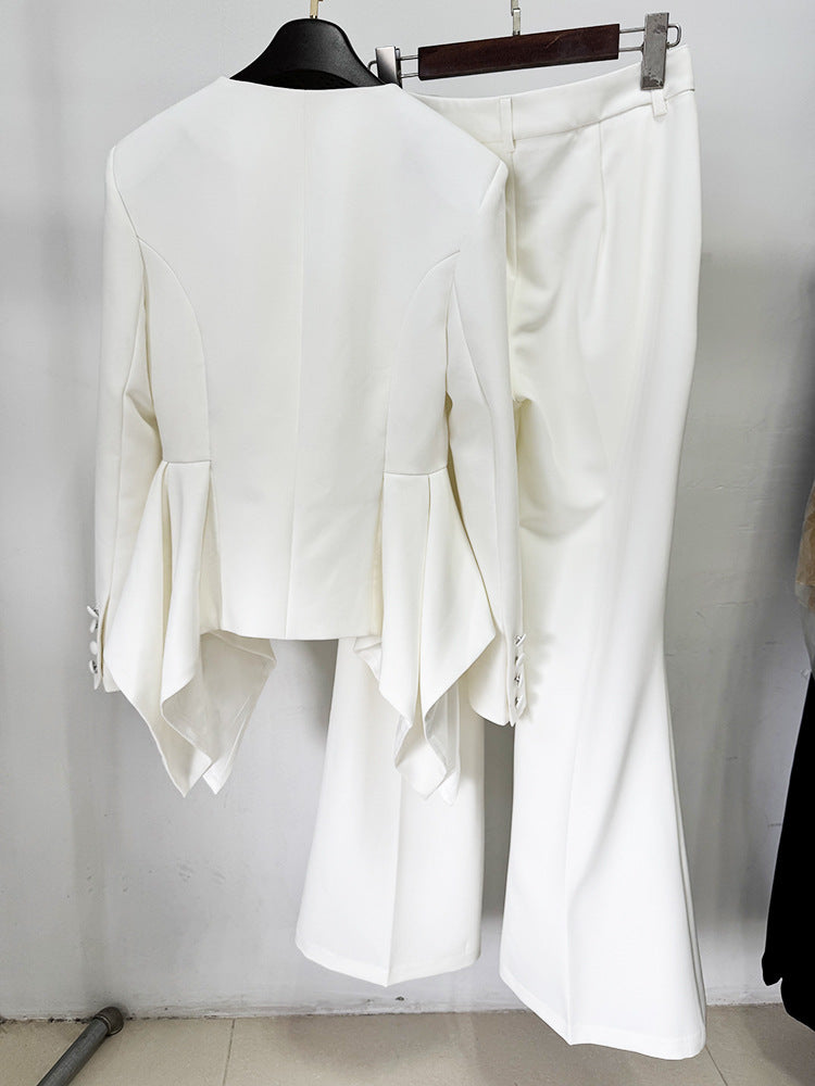 Langry fashion white asymmetrical blouse with bell sleeves and high-waisted pants set