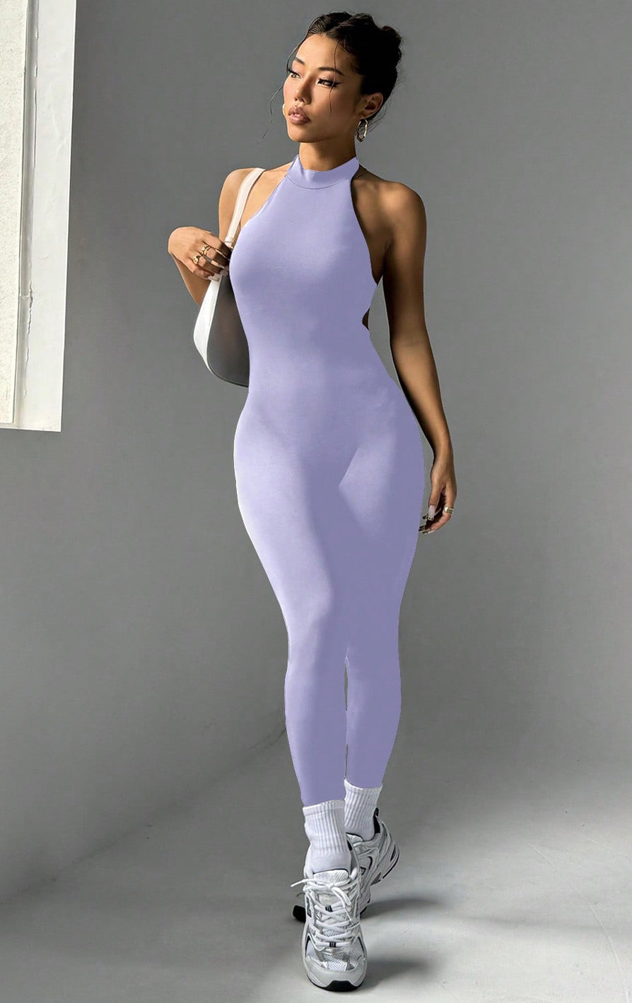 Langry fashion ملابس: lavender tight yoga jumpsuit with halter neckline