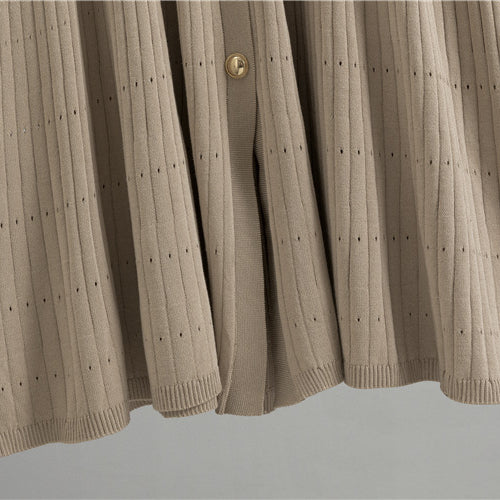 Beige pleated skirt with vertical pin-tuck detailing in French High Sense Dress winter fashion