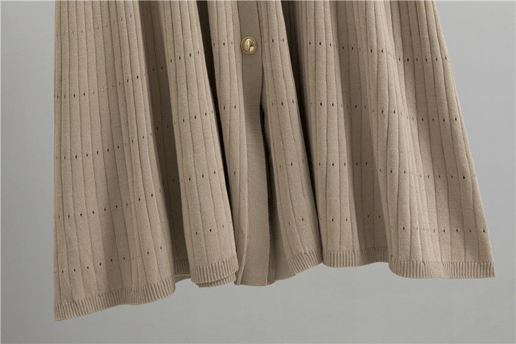 Beige pleated skirt with vertical pin-tuck detailing in French High Sense Dress winter fashion