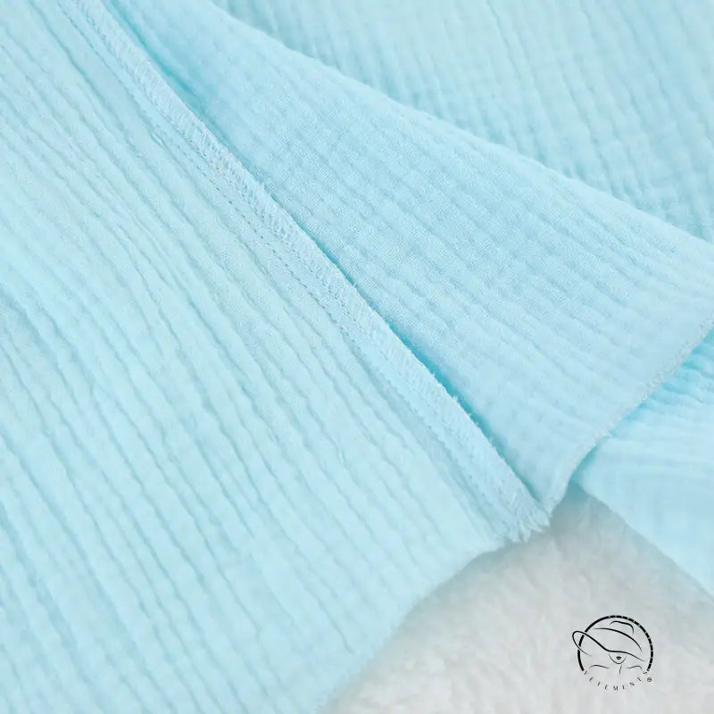 Light blue textured langry fabric diaper in Cotton Crepe pajamas