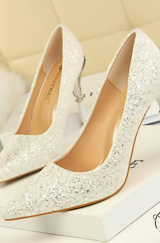 Elegant langry white glitter stiletto heels with bow and chain