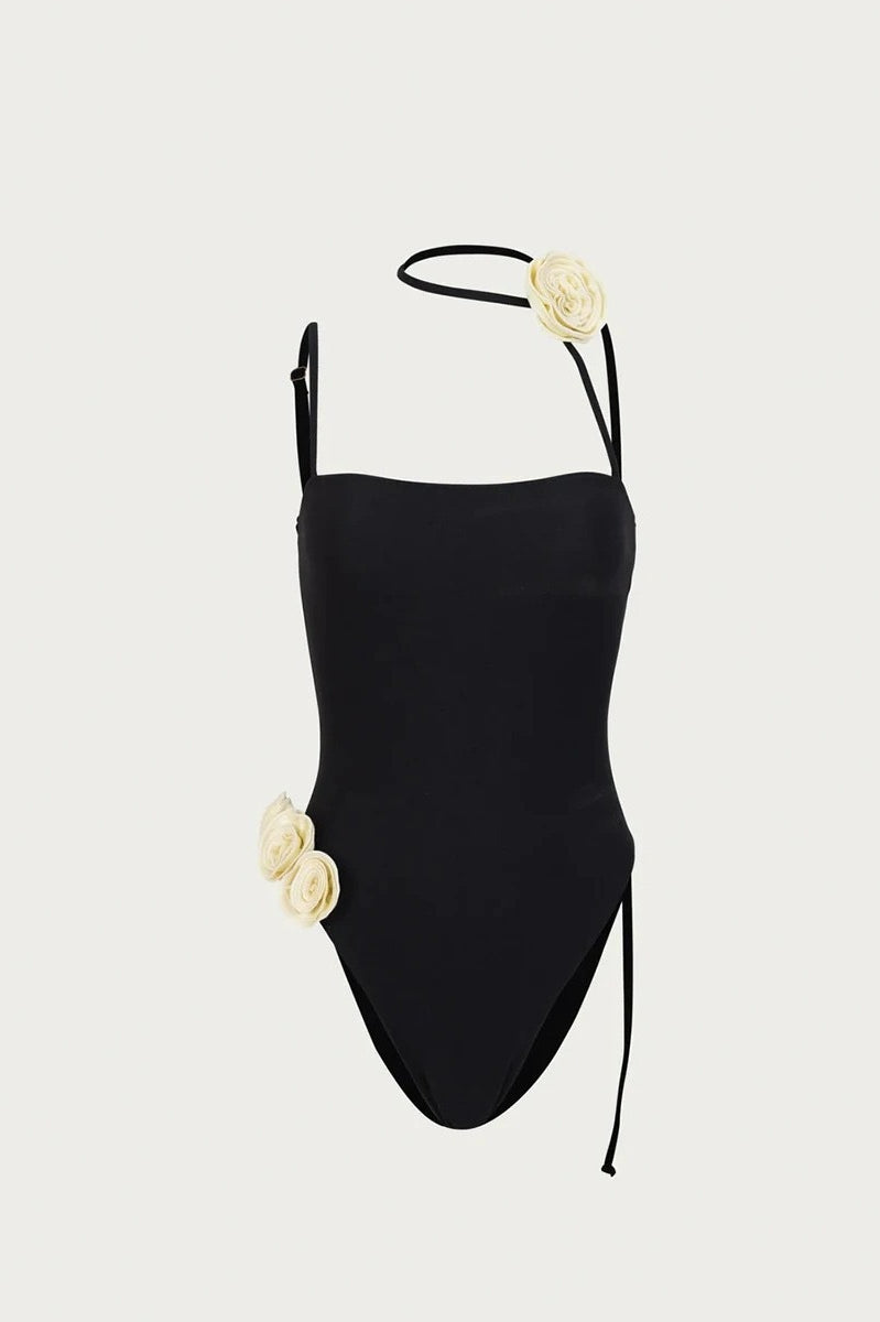 Black one-piece swimsuit with cream floral accents from Enchanting Beach Swimwear fashion