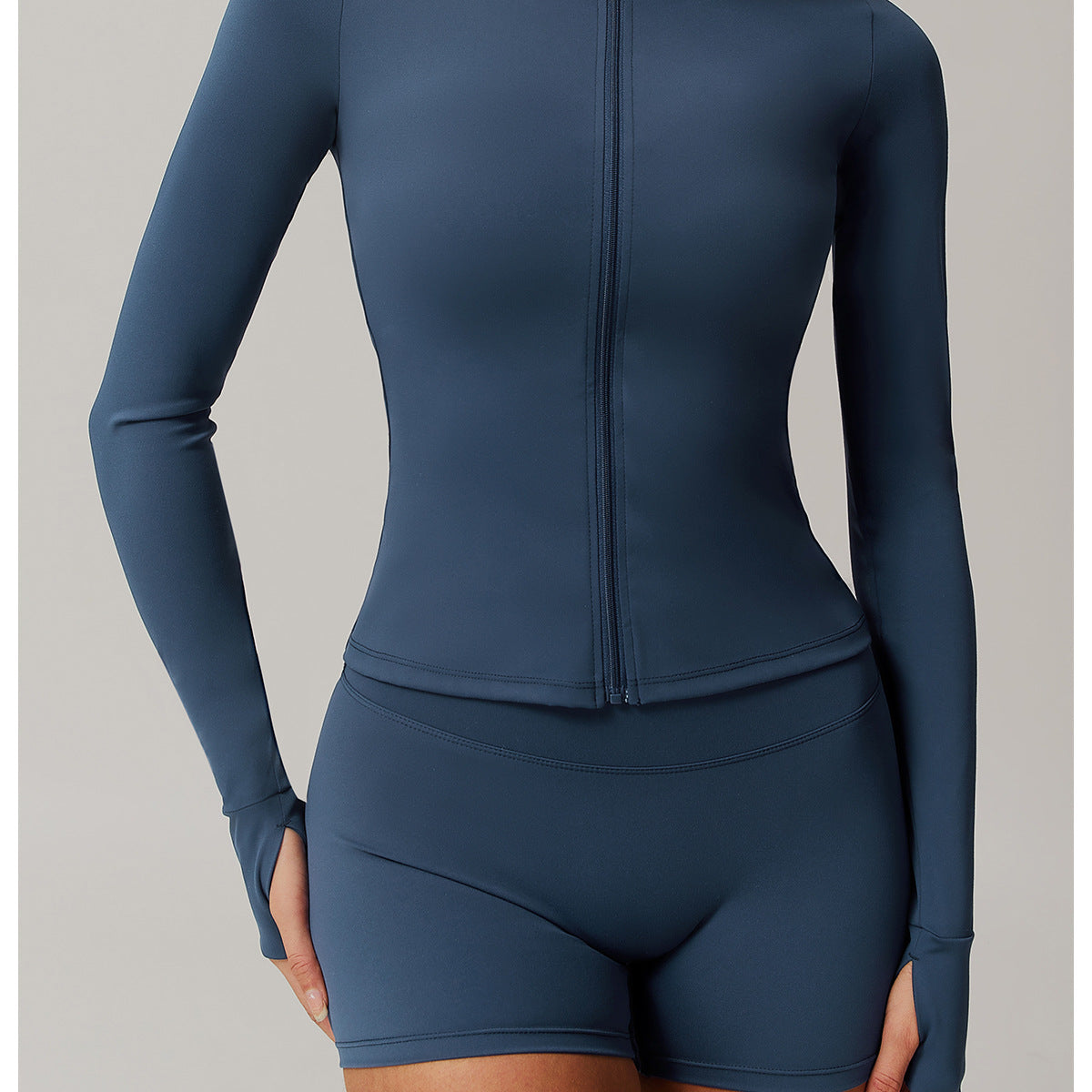 Navy blue long-sleeved hooded romper shorts for stylish workout fashion ملابس