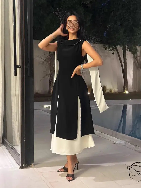 Elegant black and white langry fashion dress with asymmetrical hemline