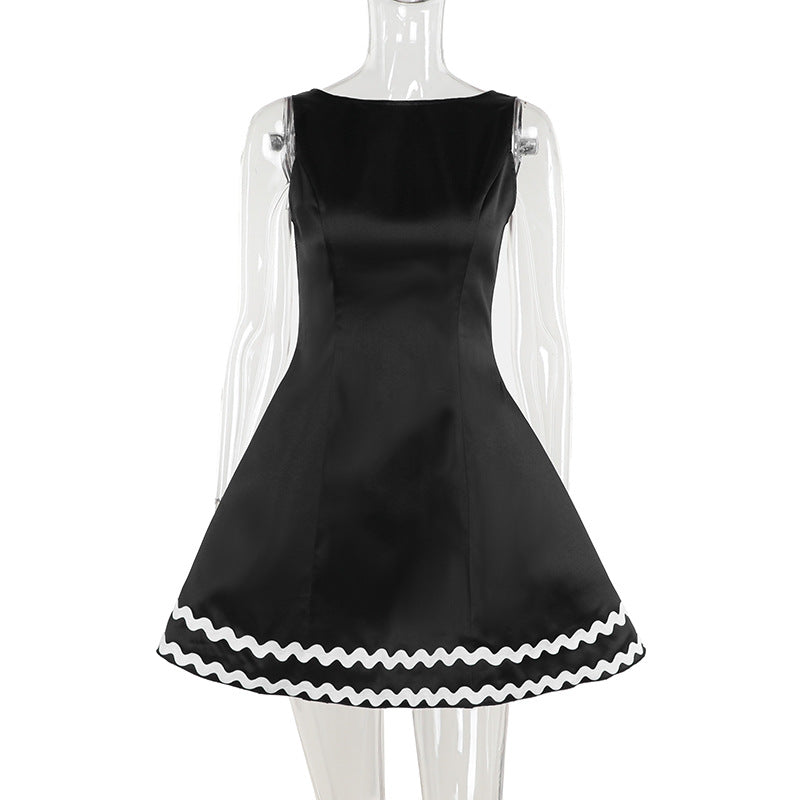 Elegant sleeveless black line dress with white scalloped hem, fashionable summer wear