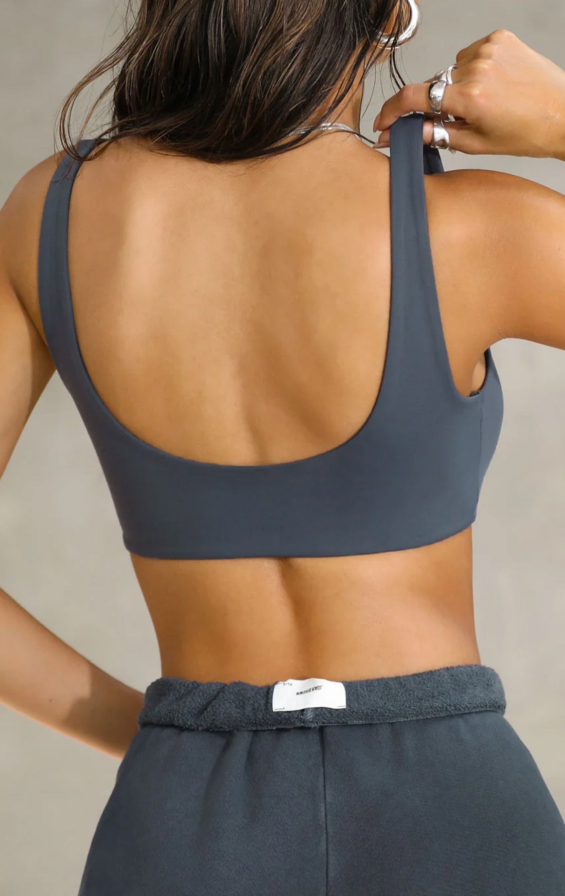 Langry dark gray minimalist sports bra with wide straps and backless design