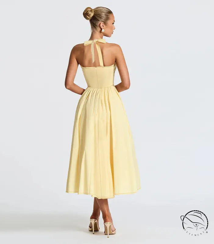 Yellow satin halter neck dress with bow back detail, Langry fashion evening maxi