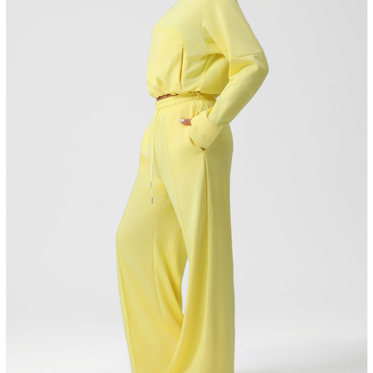 Langry fashion yellow jumpsuit with gold belt and wide-leg pants
