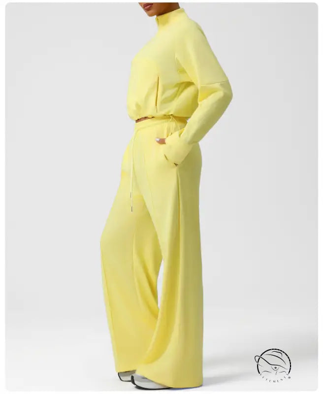 Langry fashion yellow jumpsuit with wide-leg design and gold belt