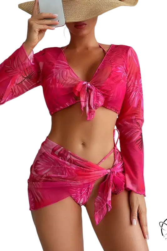 Four piece lace up swimsuit with pink tropical leaf print on red flowers background