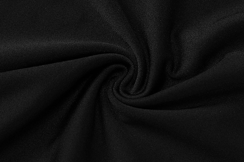 Black fabric with swirling pattern on Backless Long Sleeves Bell Bottom Pants Slim Fit