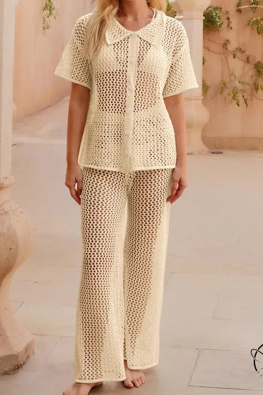 Cream-colored crochet beach loose shirt and casual trousers set