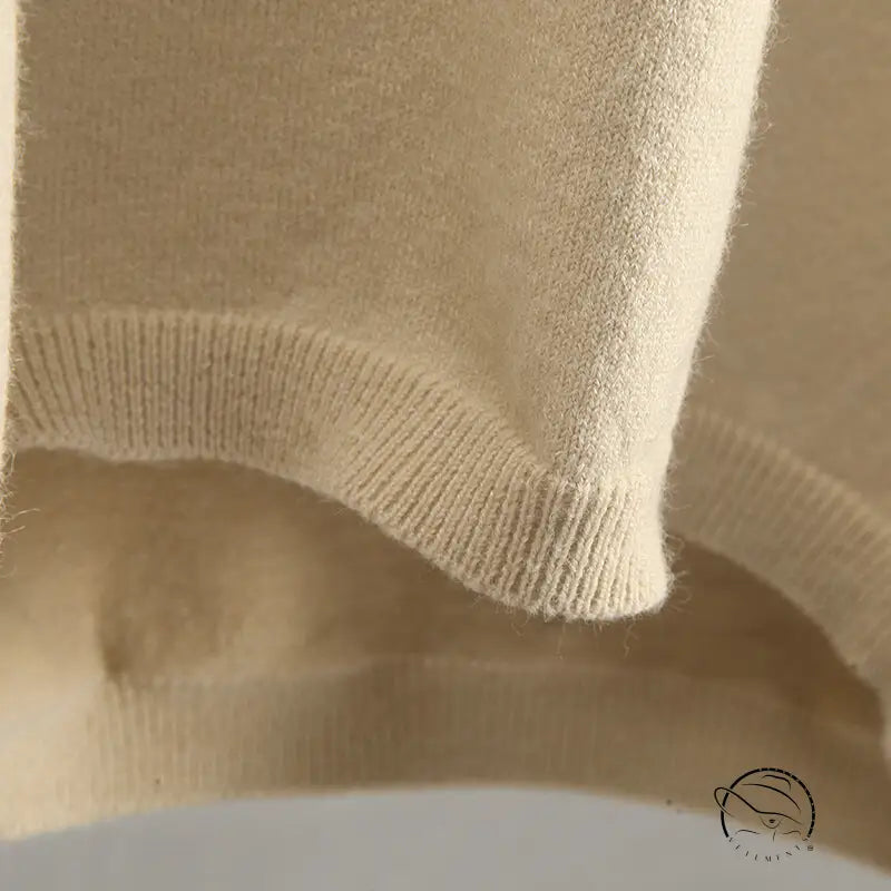 Close-up of cream-colored ribbed knit Warm Polo Collar Sweater by Langry fashion