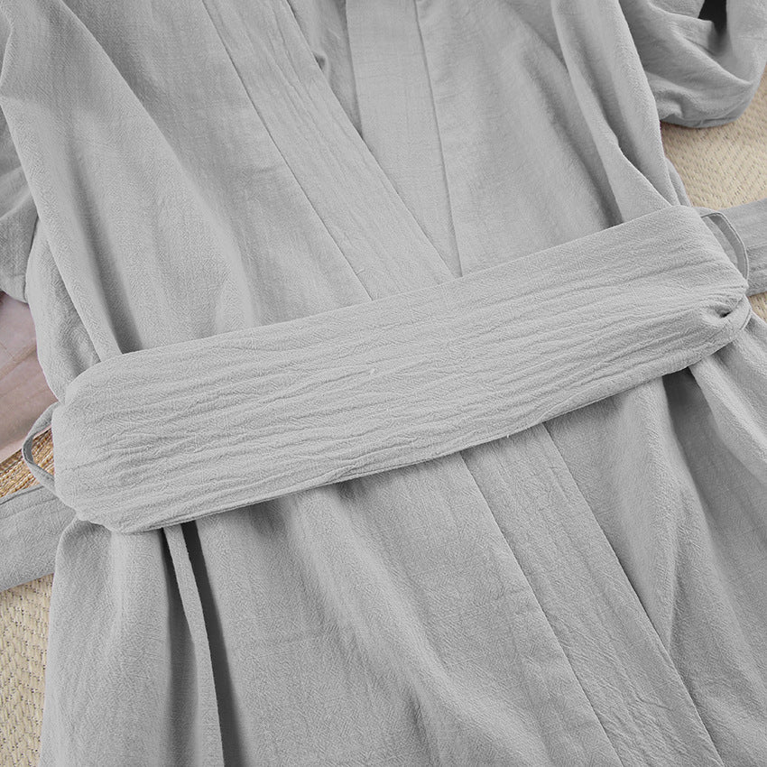 Light grey textured cotton bathrobe with tied belt, ideal for loose casual cotton pajamas