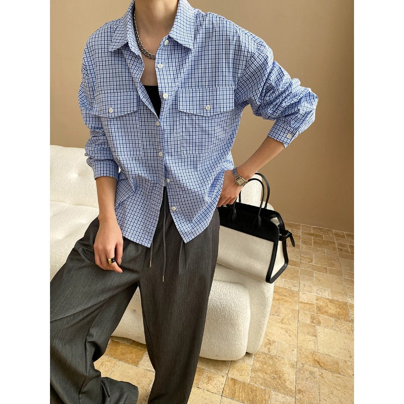 Blue and white gingham long sleeve shirt with chest pockets for fashionable layering