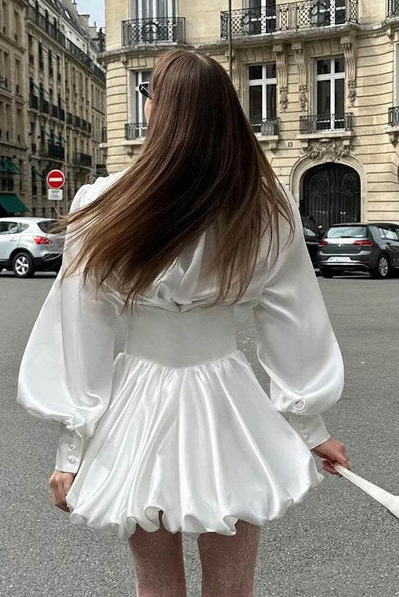 Elegant white satin mini dress with v neck and lantern sleeves, perfect for fashion